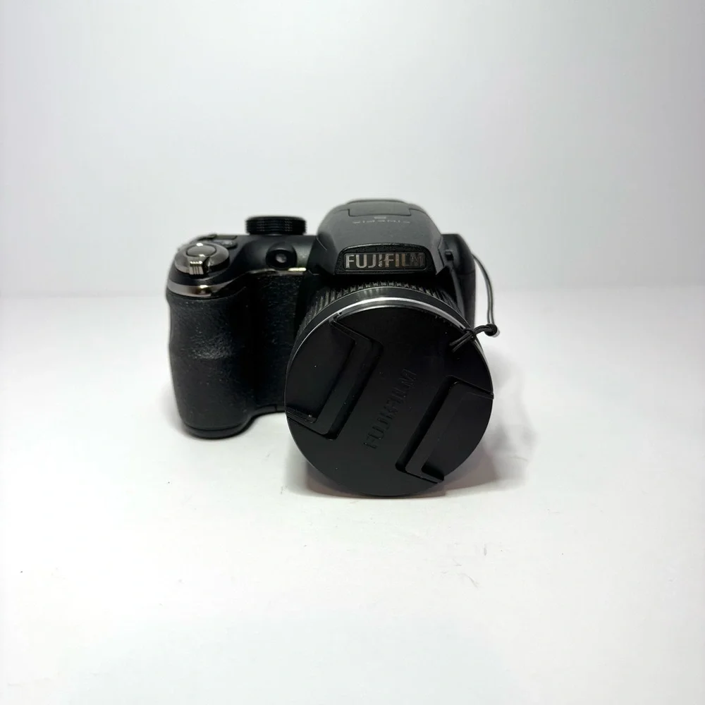 Fujifilm Black Digital Camera with Ergonomic Design and Prominent Lens